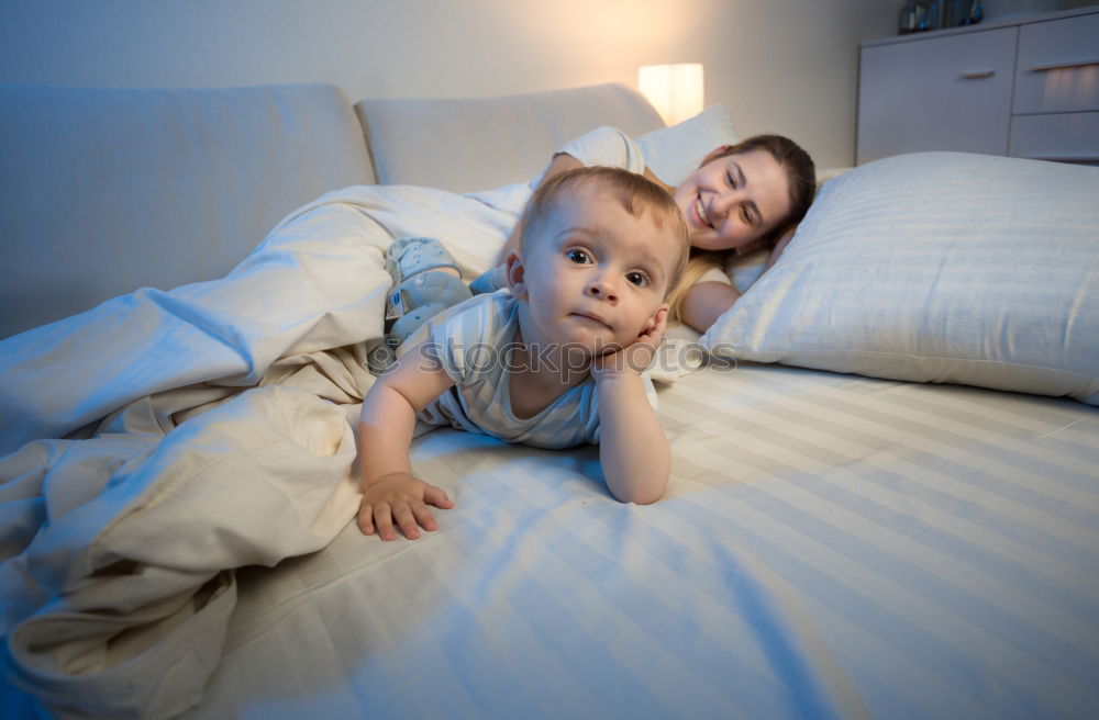 Similar – Image, Stock Photo Boy and girl reading a book