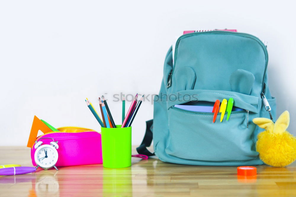 Similar – Image, Stock Photo Backpack and school supplies: books, magnifying glass, notepad