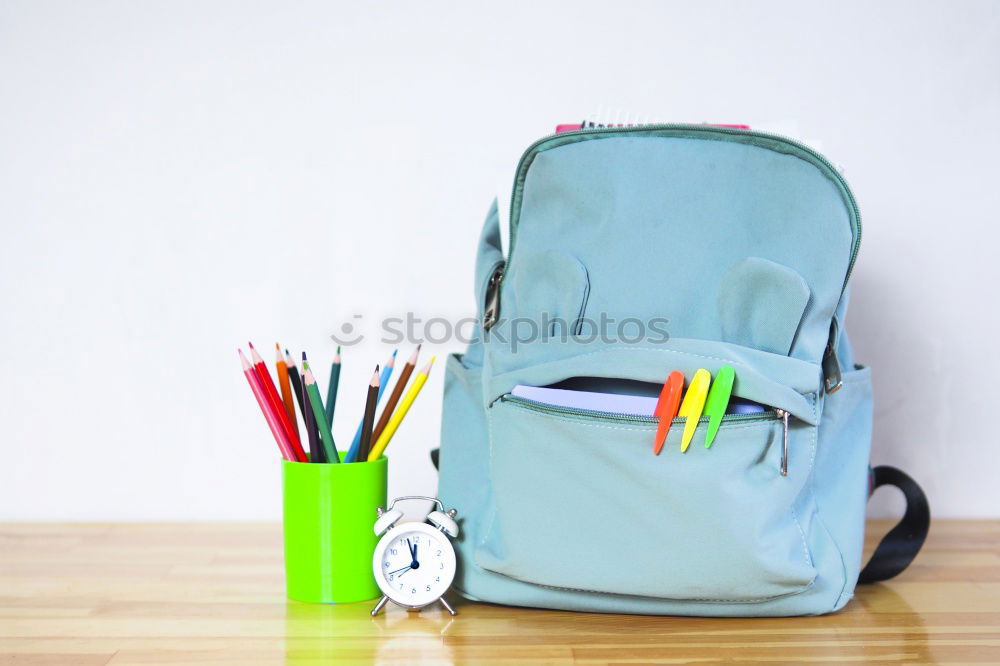 Similar – Image, Stock Photo Backpack and school supplies: books, magnifying glass, notepad