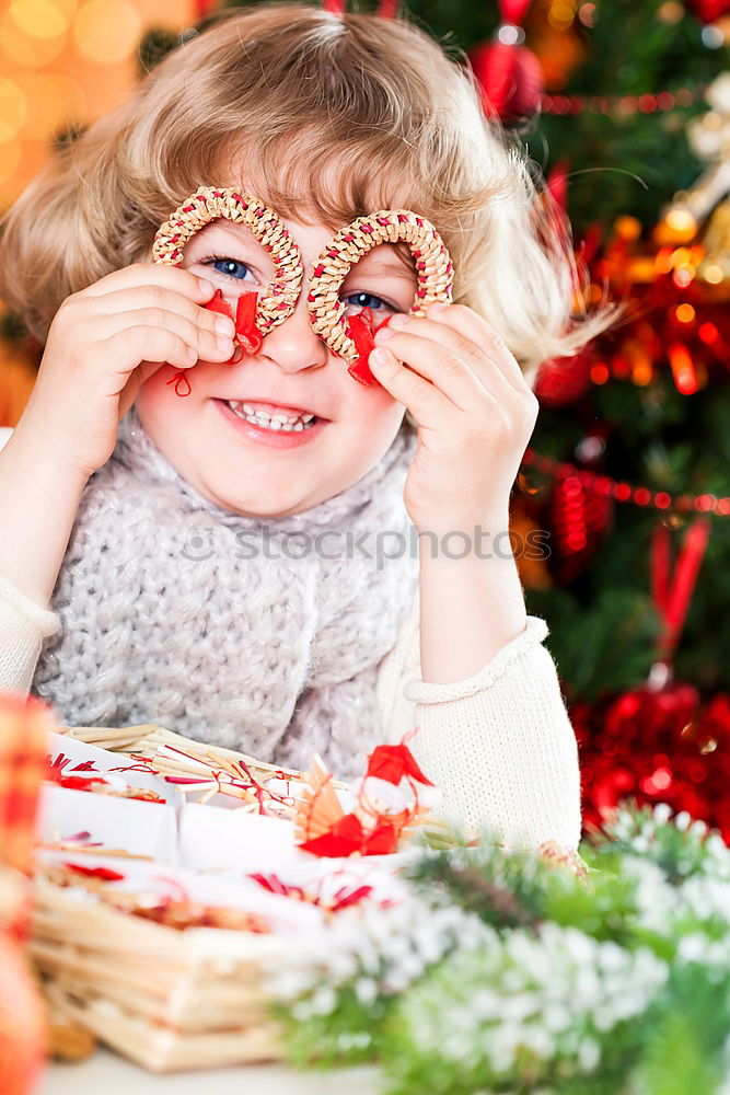 Similar – Mother and son decorating Christmas biscuits at home