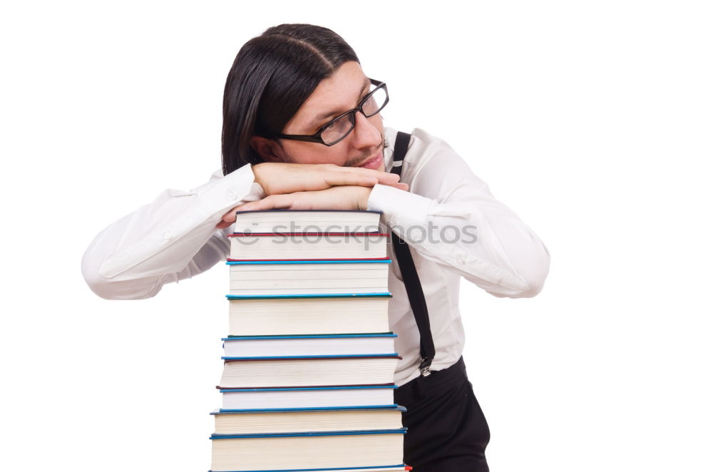 Similar – Man in book pile reading a book