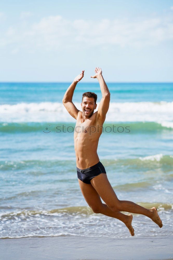 Similar – handsome swimmer putting on goggles