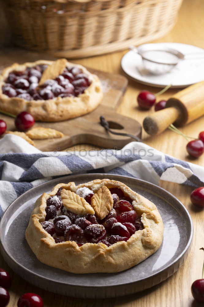 Similar – Delicious tartlets with raspberries and blueberries