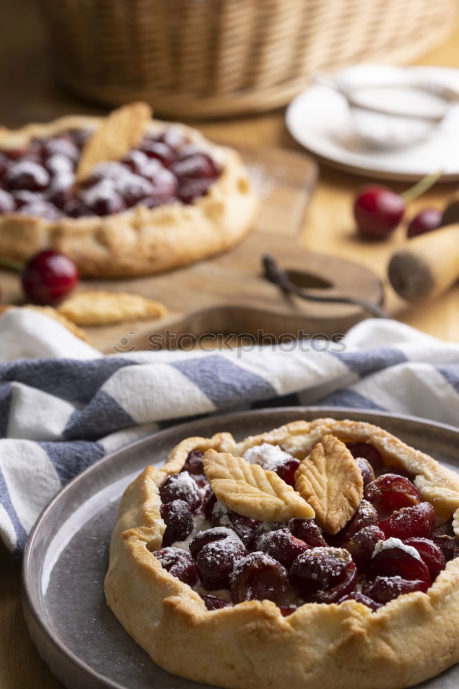 Similar – Delicious tartlets with raspberries and blueberries