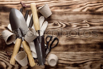 Similar – Grill pan and wooden kitchenware on a brown wooden surface