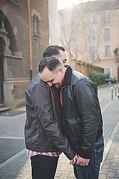 Similar – Embracing and laughing gay couple