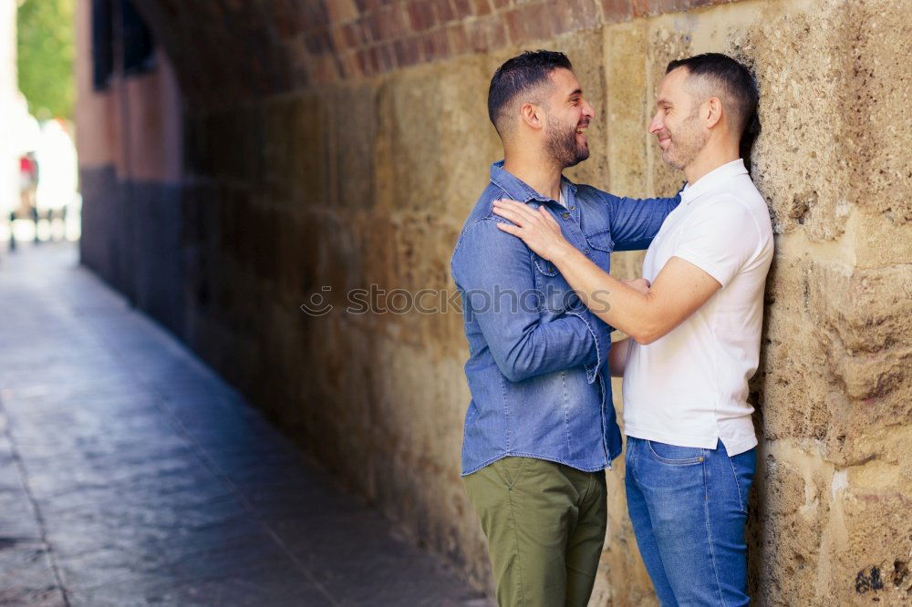 Similar – Embracing and laughing gay couple