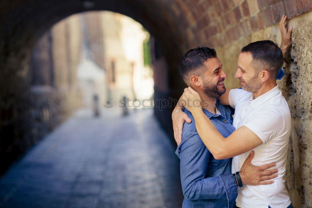 Similar – Embracing and laughing gay couple