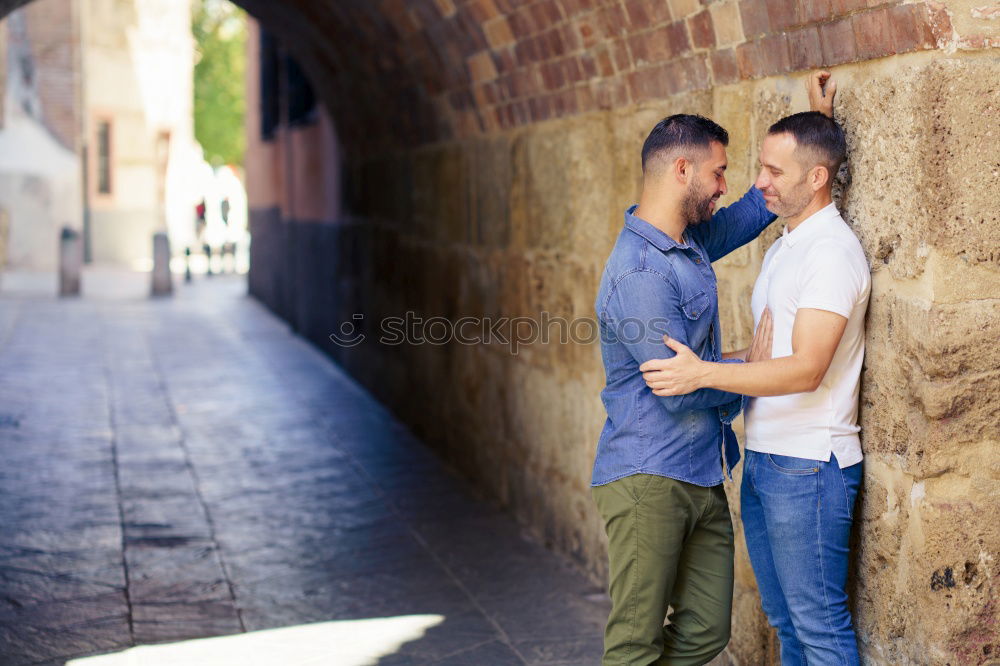 Similar – Embracing and laughing gay couple