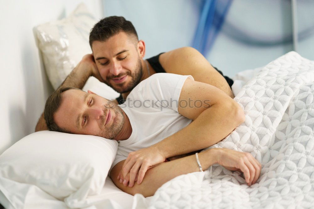 Similar – Gay couple sleeping in each other’s arms.