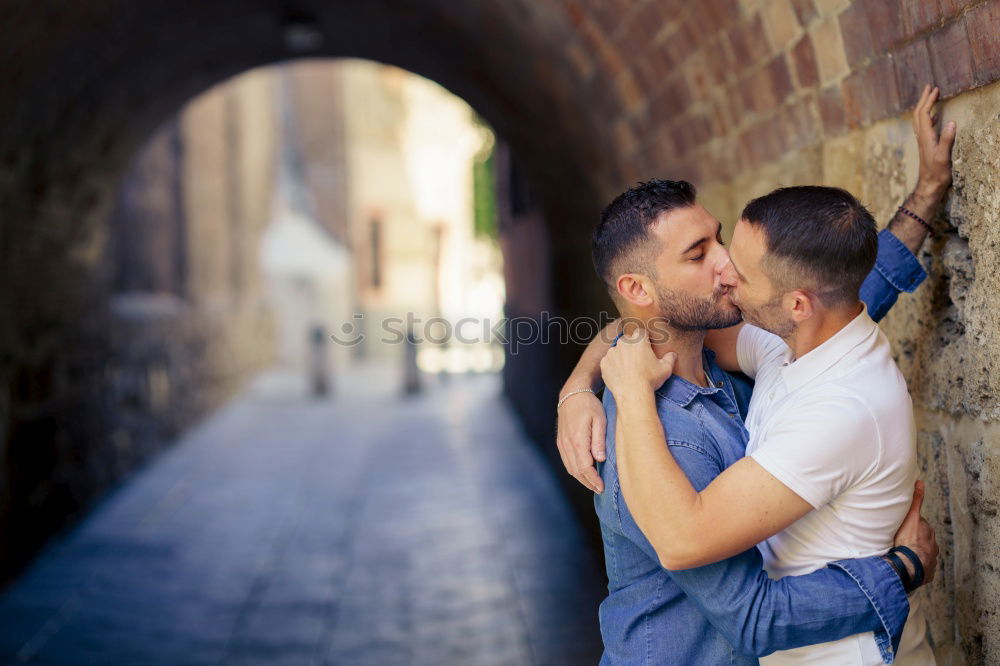 Similar – Embracing and laughing gay couple