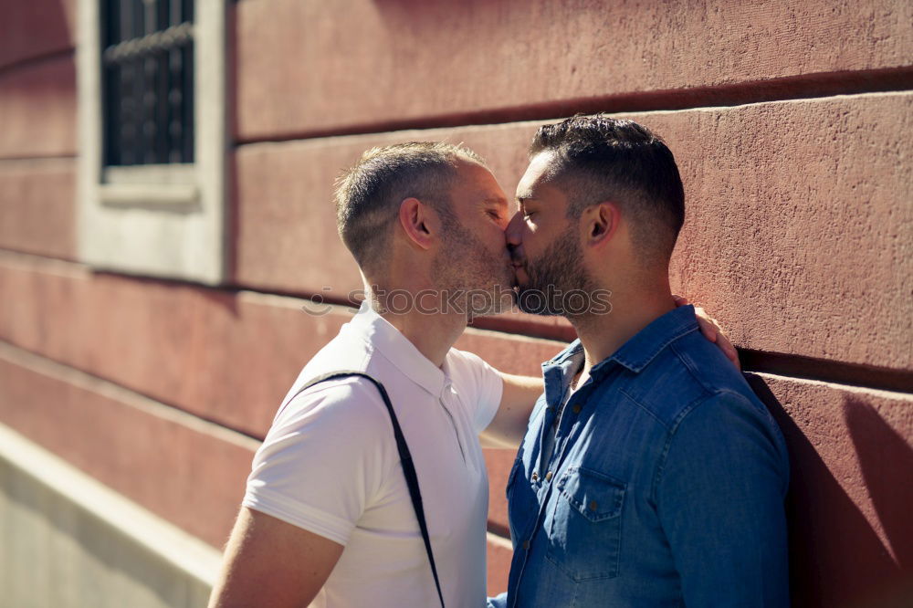 Similar – Embracing and laughing gay couple