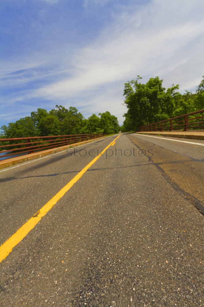 Similar – Desert road and mountains unreal