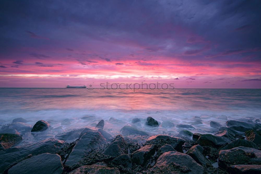 Similar – Image, Stock Photo Sea waving near rough rocks during sunset