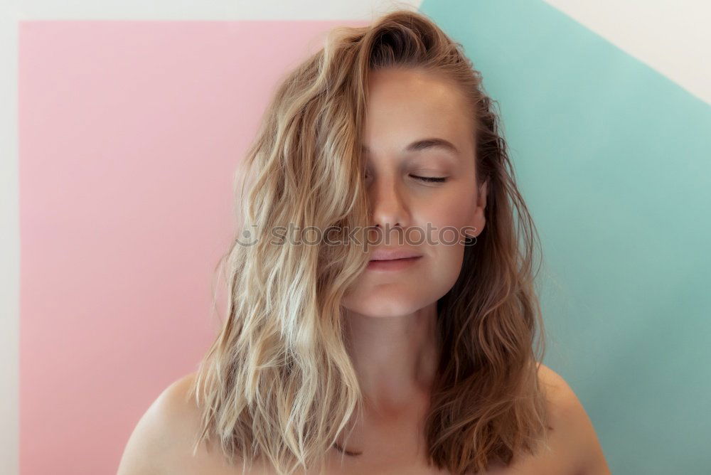 Similar – Close-up of the face of a brunette girl with short hair