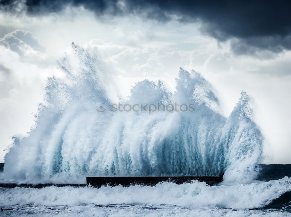 Similar – Tourist standing at wavy ocean