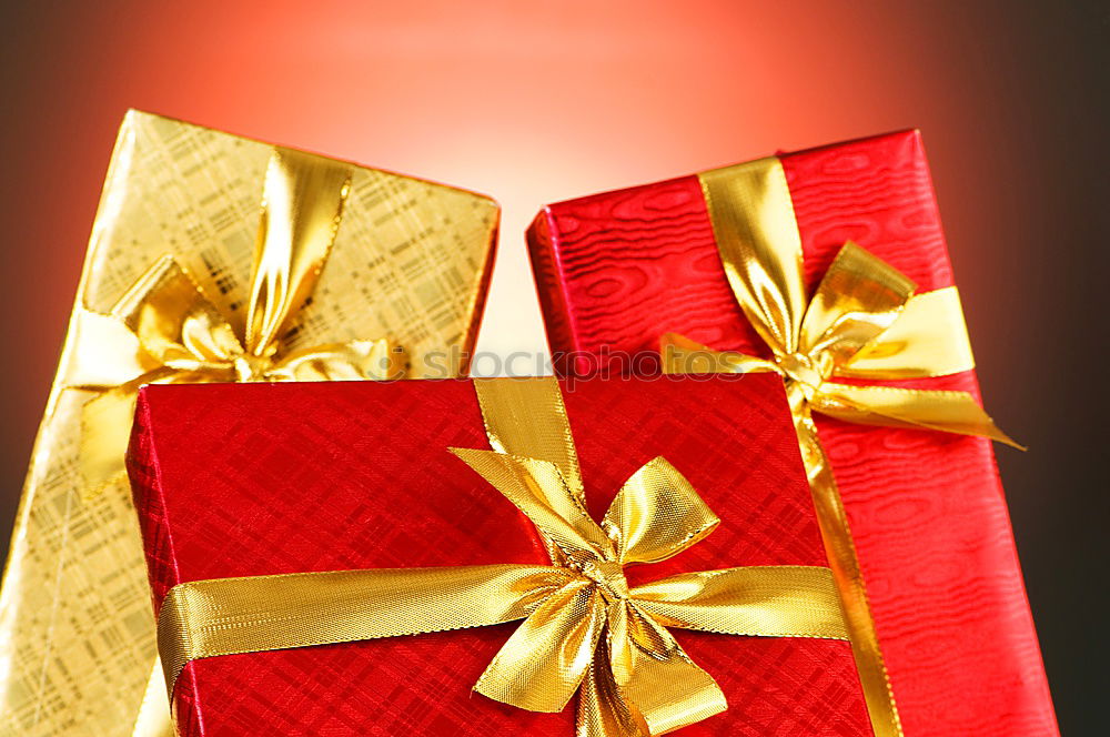 Similar – Christmas gifts presents on red glitter background. Copyspace