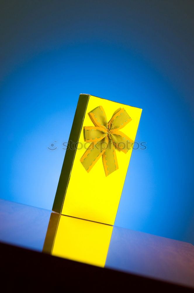 Similar – Image, Stock Photo gift box wrapped in kraft paper tied with ribbon