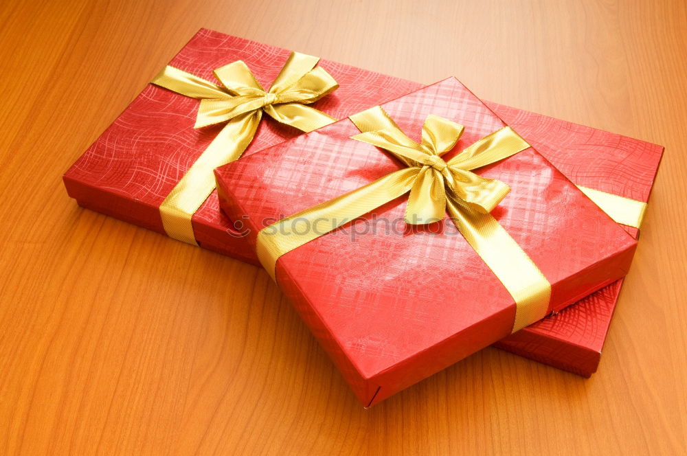 Similar – Christmas gifts presents on red glitter background. Copyspace