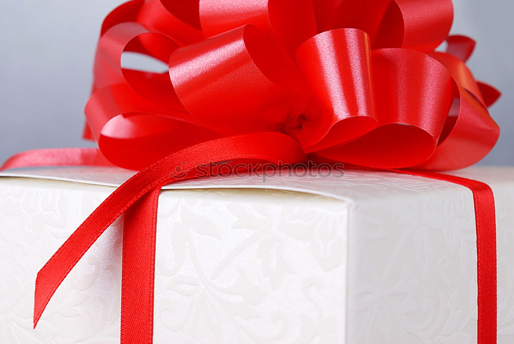 Similar – Christmas gifts presents on red glitter background. Copyspace