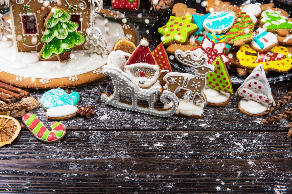 Similar – Gingerbread man with mulled wine, Christmas decoration and cookies