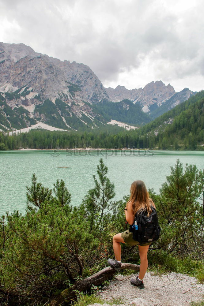 Similar – Image, Stock Photo Handsome tourist at mountain lake