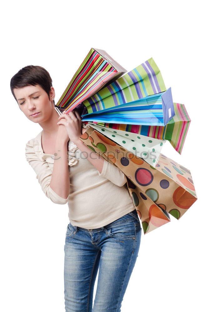 Similar – Young woman putting old books to paper bag in antique bookstore