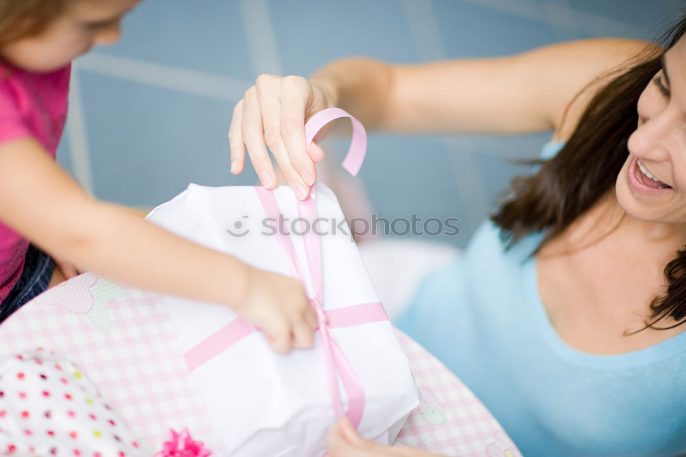 Similar – mother brushing toddler daughter’s hair