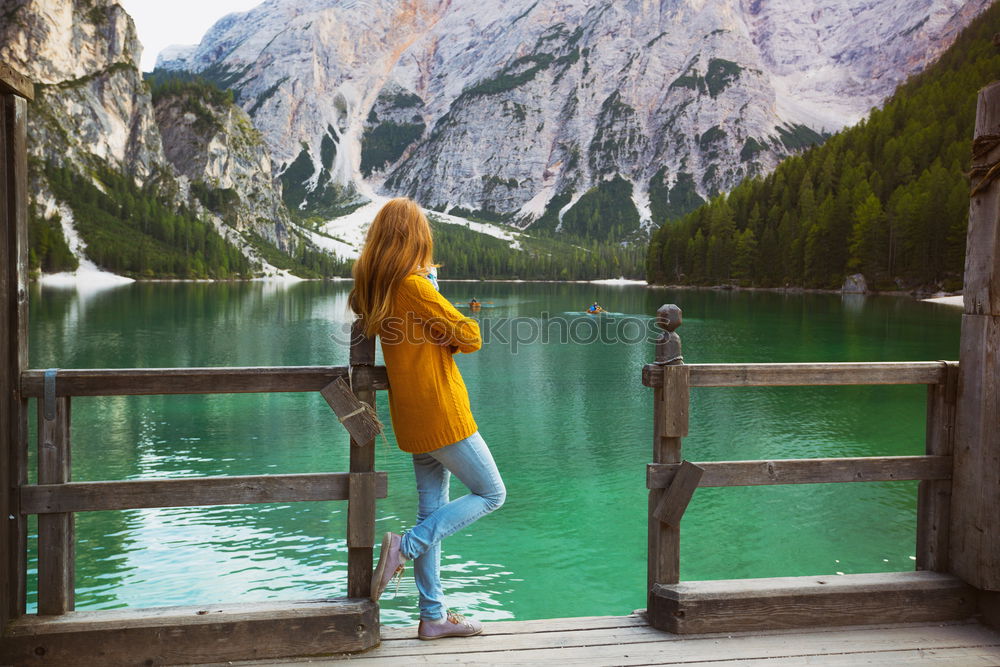 Similar – Image, Stock Photo Cheerful women sitting at lake