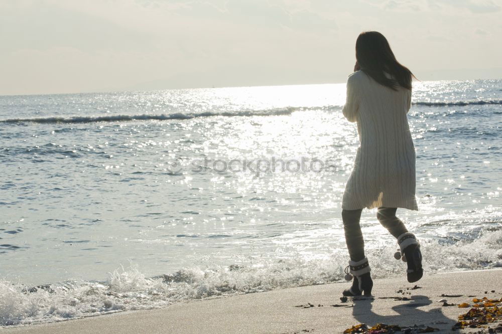 Similar – Image, Stock Photo Pensive woman on the beach