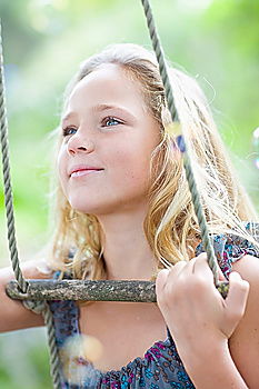 Similar – Image, Stock Photo Happy little girl playing on the playground at the day time