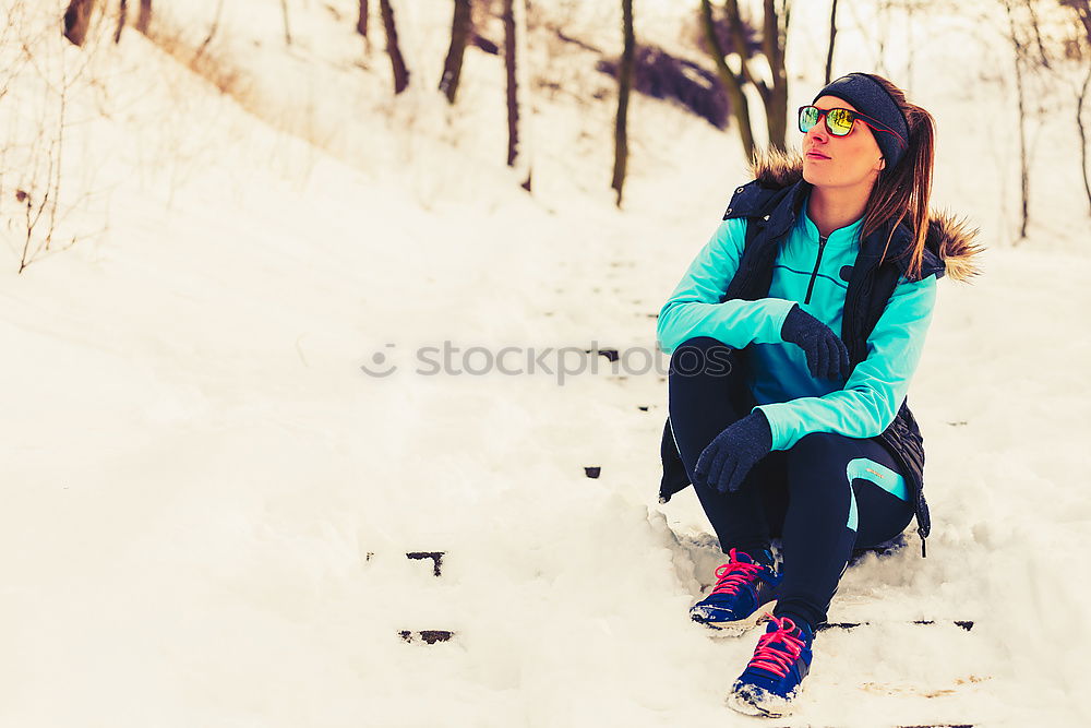 Similar – Image, Stock Photo A woman is standing in the snow.  Next to her two empty footprints. She wears black and white striped stockings and purple boots.