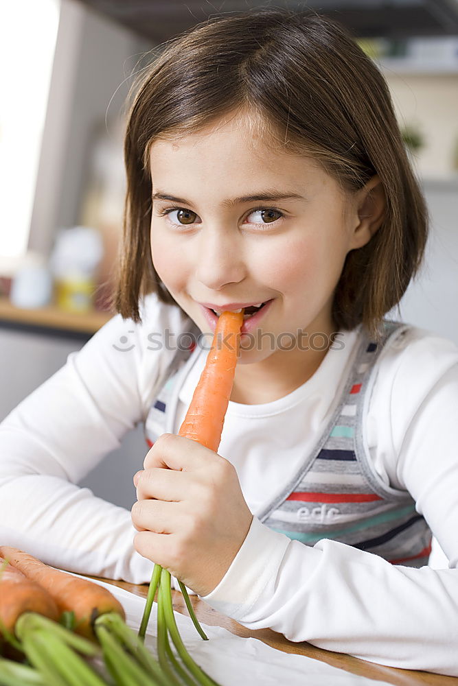 Image, Stock Photo child girl helps mom to cook