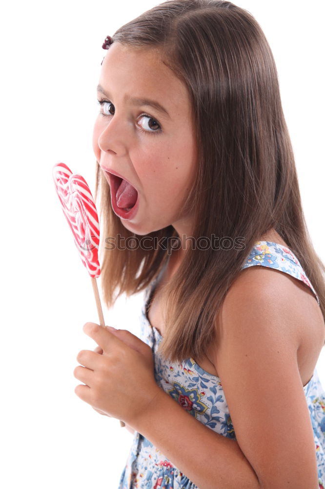 Young woman with cookie and coffee mug
