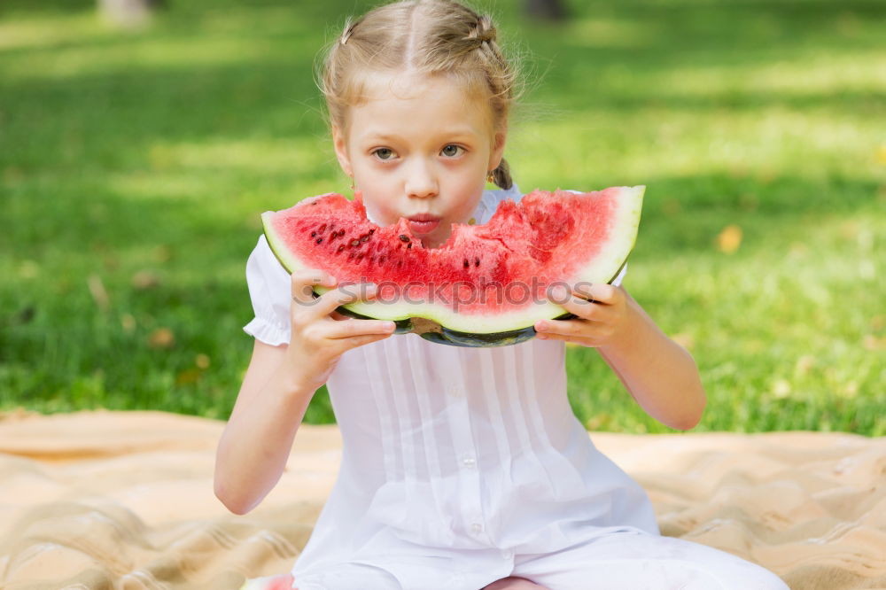 Similar – Image, Stock Photo Beautiful kid girl eating watermelon