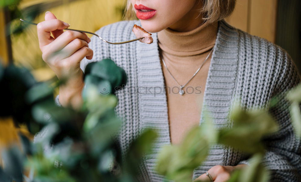 Similar – from above Crop woman eating sushi