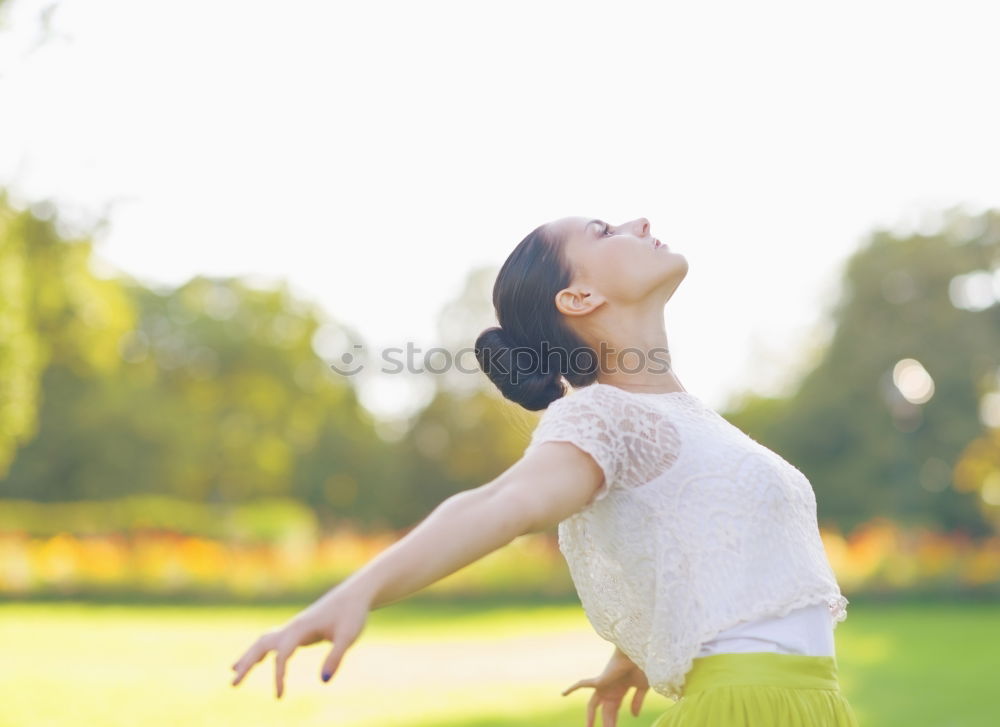 Similar – Women wearing t-shirt and jeans stays outdoor in the park