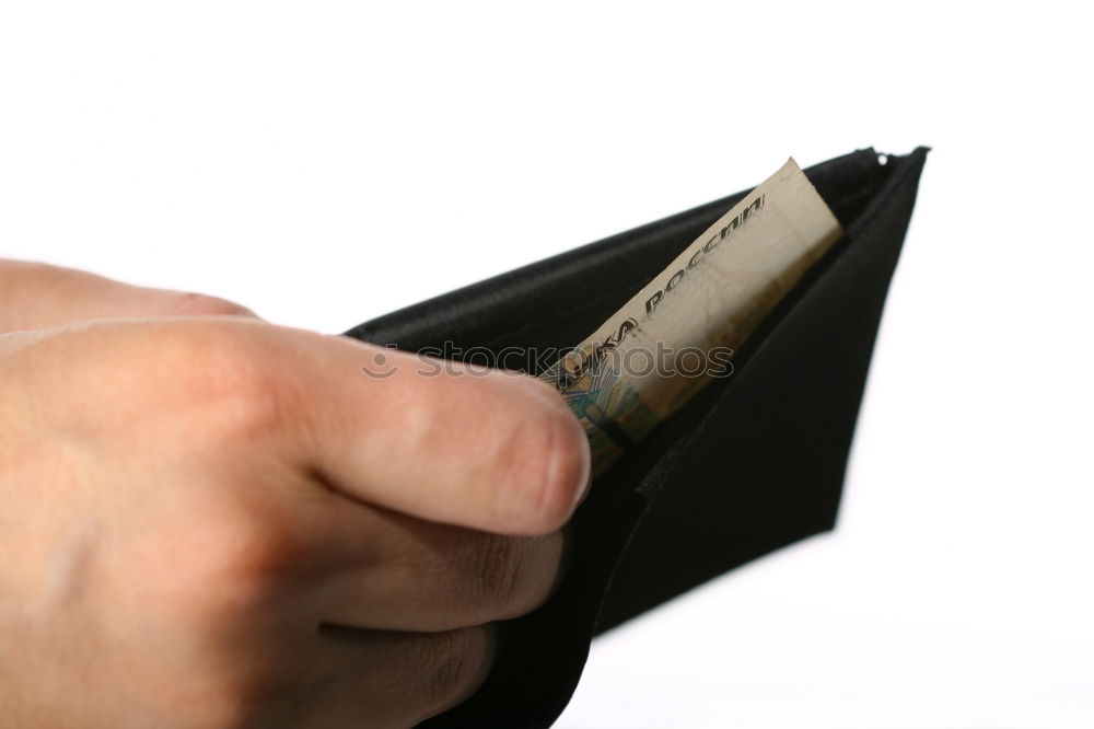 Similar – two female hands hold brown leather open empty wallet for cash