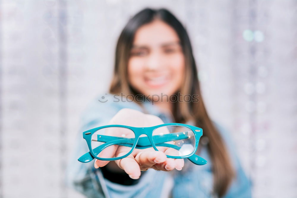 woman covering her eyes with pieces of sushi