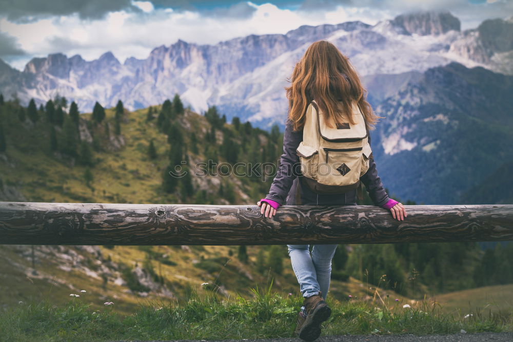 Similar – Image, Stock Photo Young woman crossing the Alps