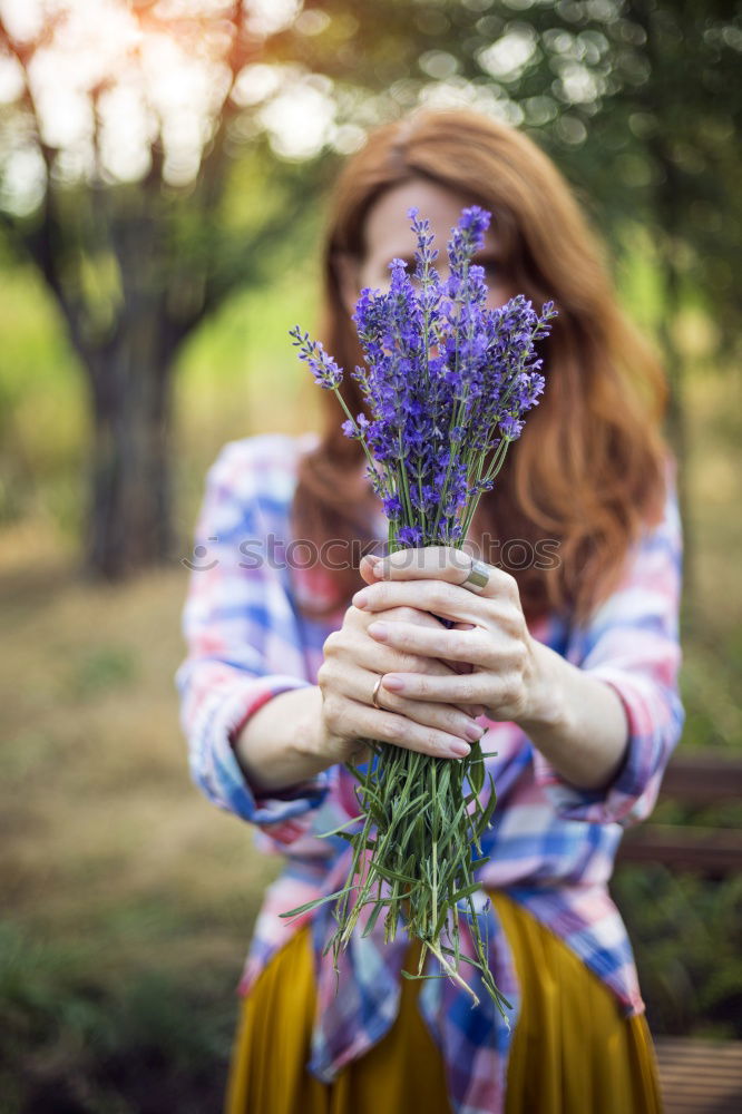 Similar – Image, Stock Photo Woman touching yellow flower