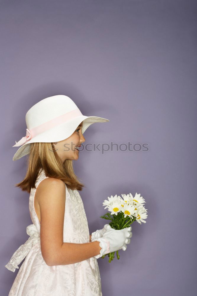 Similar – Small girl with a beautiful daisy