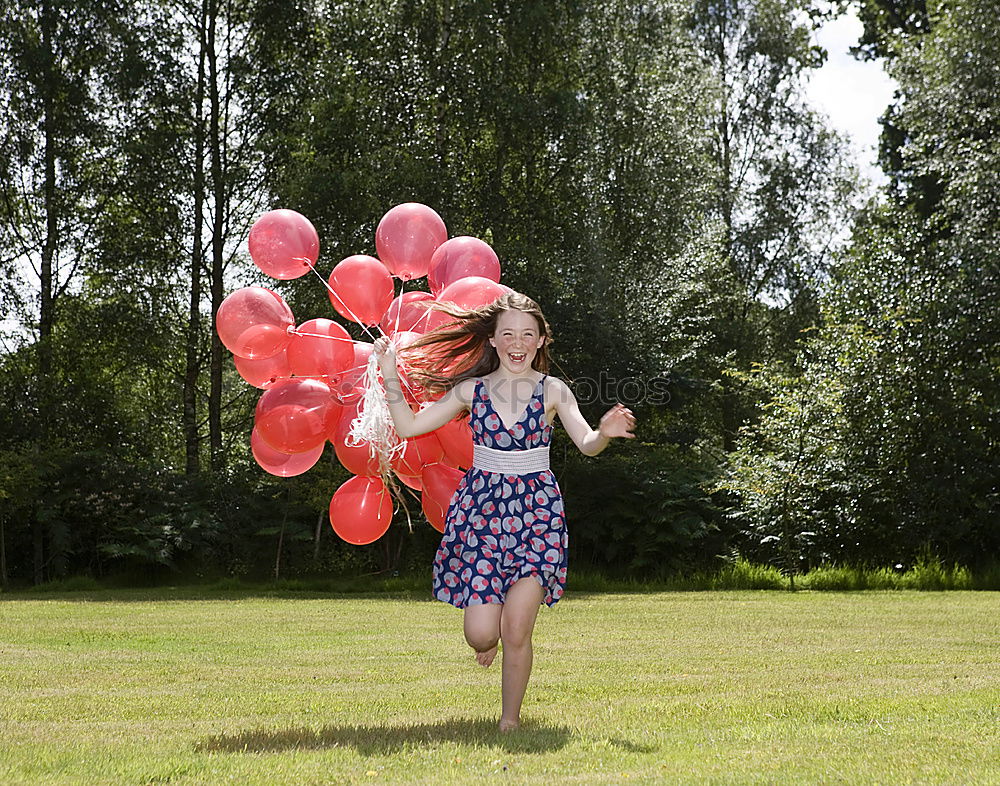 Similar – Girl with balloons