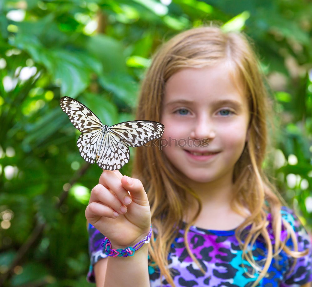 Similar – Image, Stock Photo Nina and the Butterfly