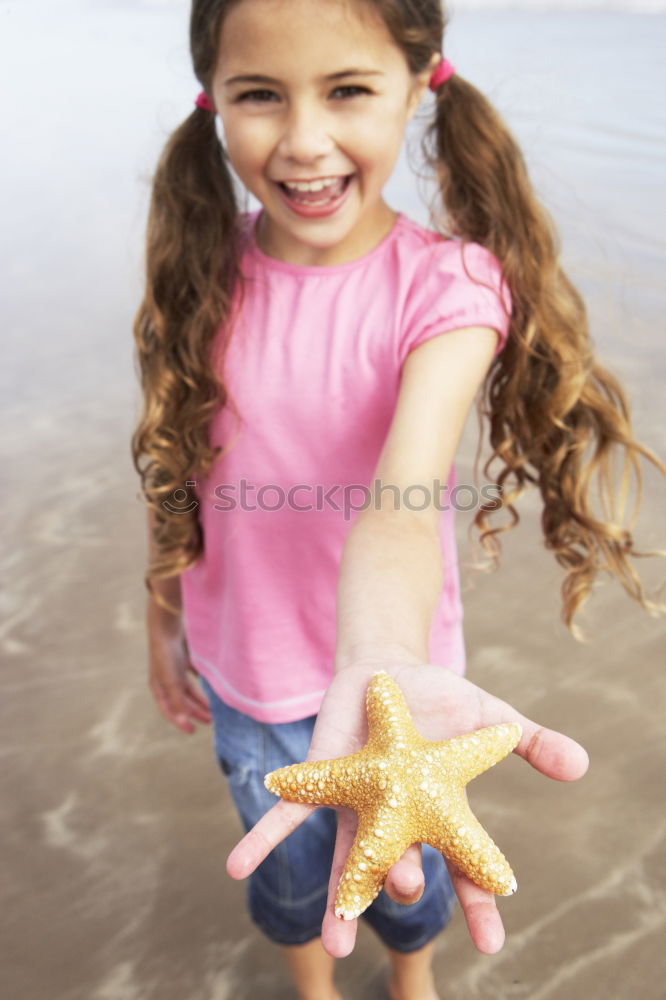 Similar – Image, Stock Photo Little girl holding starfish