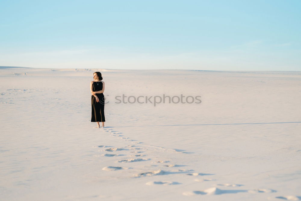 Similar – Image, Stock Photo Anonymous man walking on sand hills