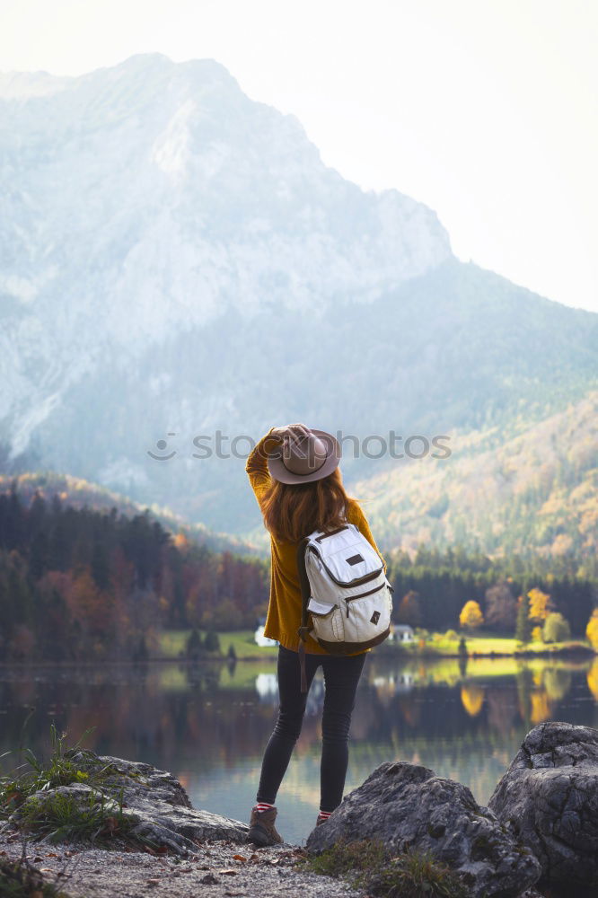 Similar – Image, Stock Photo Woman looking at mountain lake