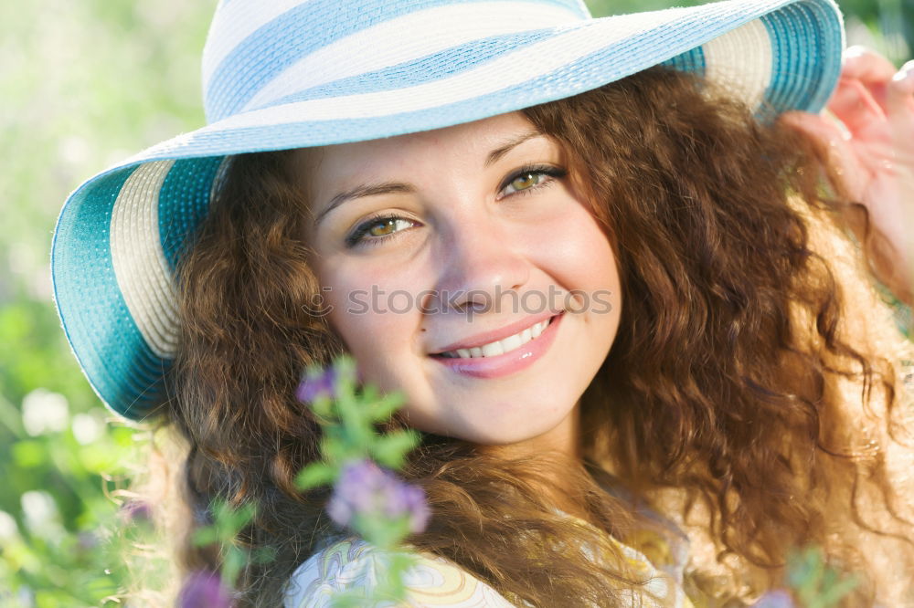 Similar – Black woman with afro hairstyle smiling in urban park.