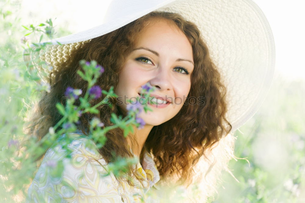 Similar – Image, Stock Photo Portrait of tall beautiful woman with long dark curly hair in forest