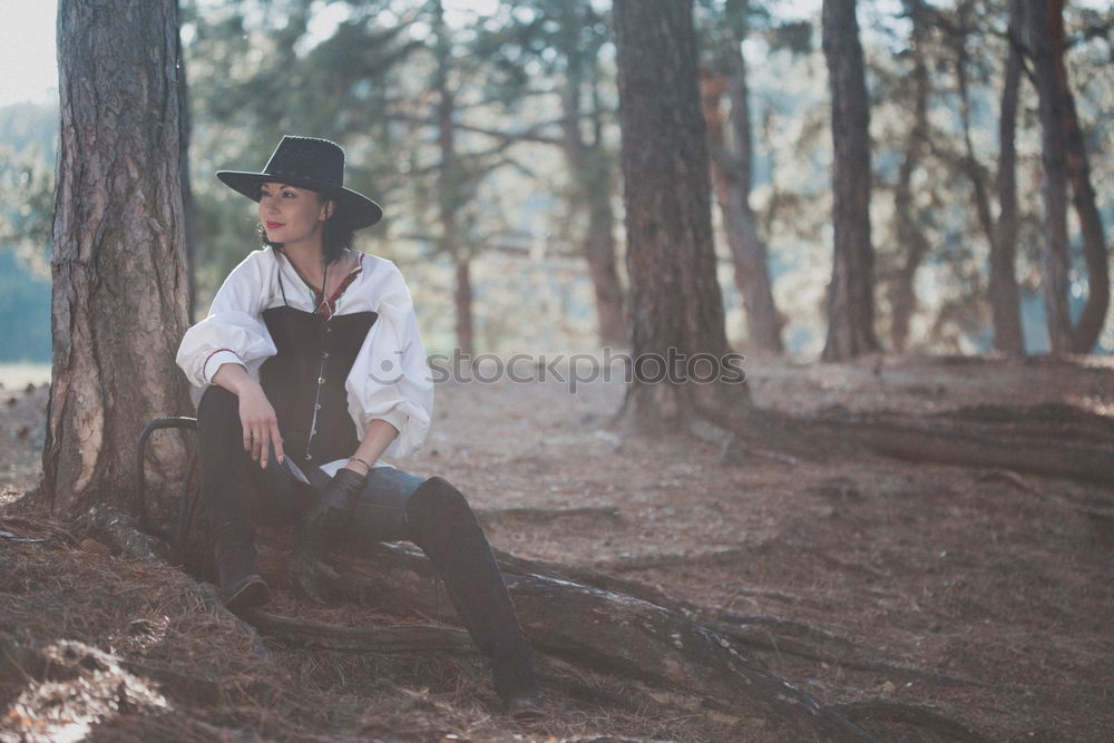 Similar – thoughtful little boy sitting on field